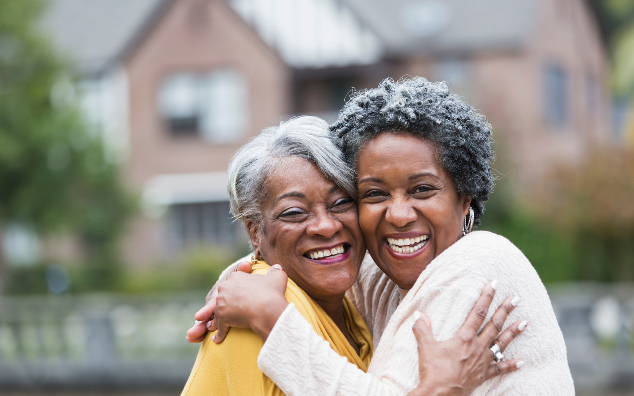Two ladies hugging